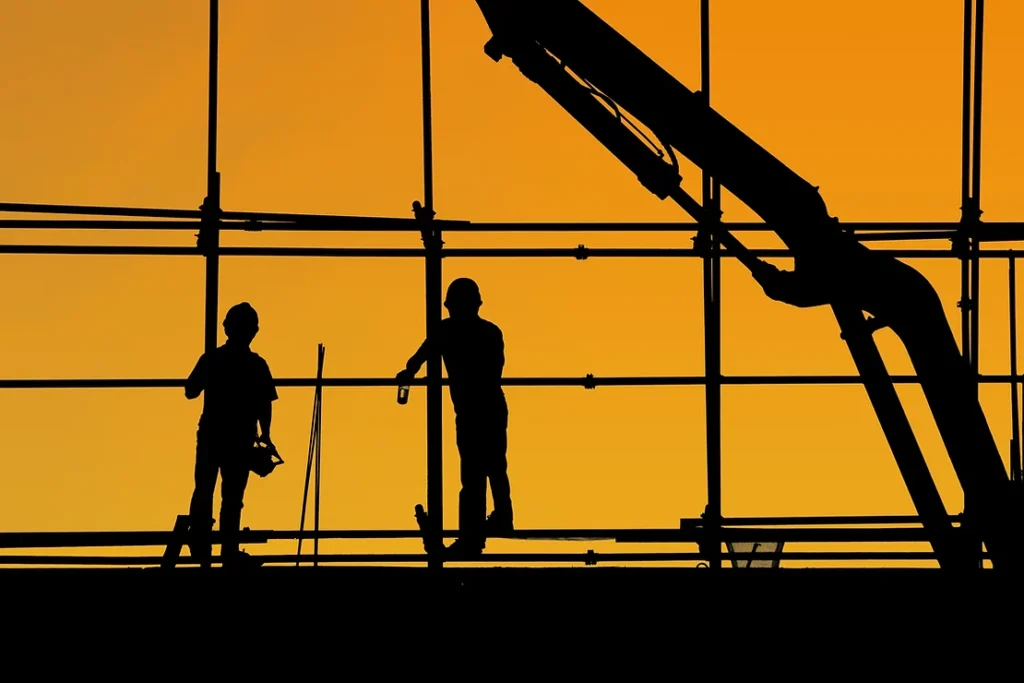 Minsite workers on orange background