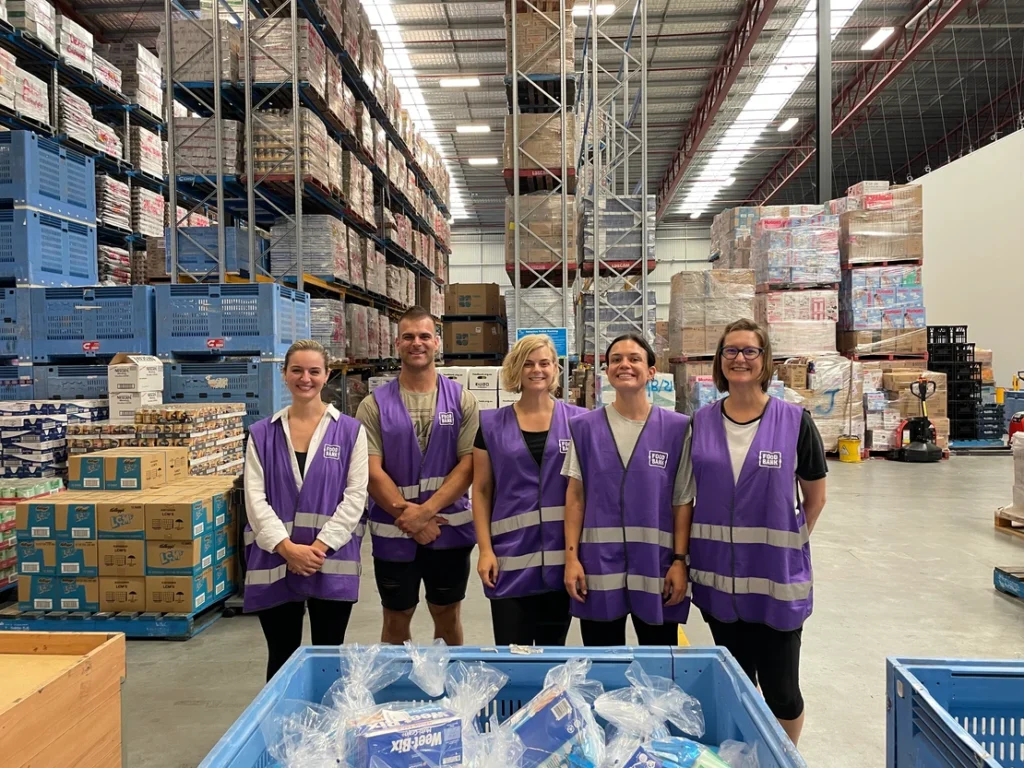 Volunteers in foodbank warehouse